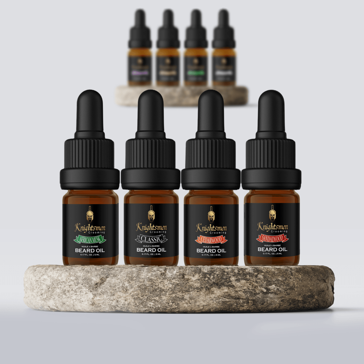 Beard oil bundle 5 ml bottles with caps on shelf—African Musk, Classic, Cedarwood, Sandalwood travel pack.