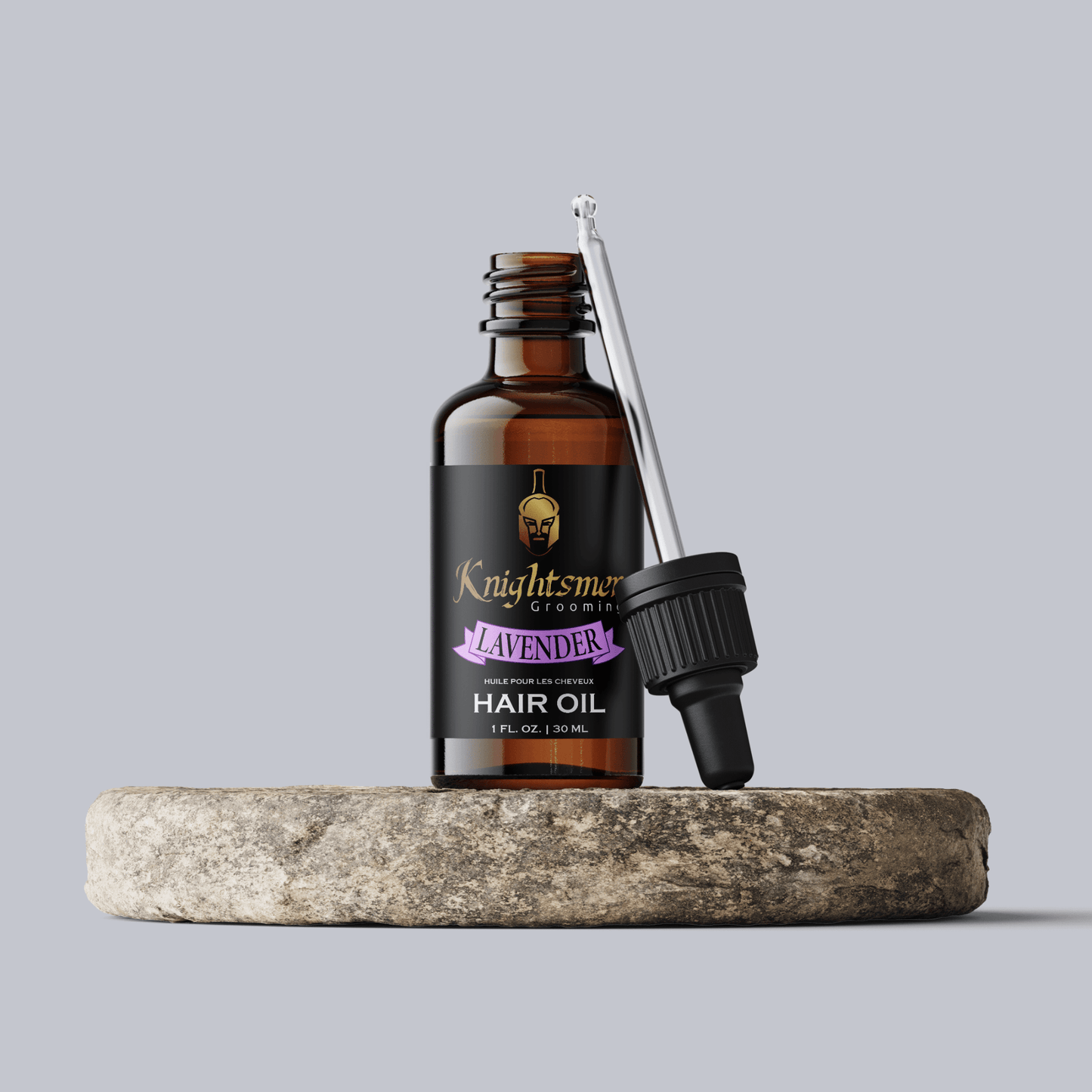 Premium Lavender Organic hair oil with glass dropper on stone—hydrating, hair growth formula and strengthening formula.