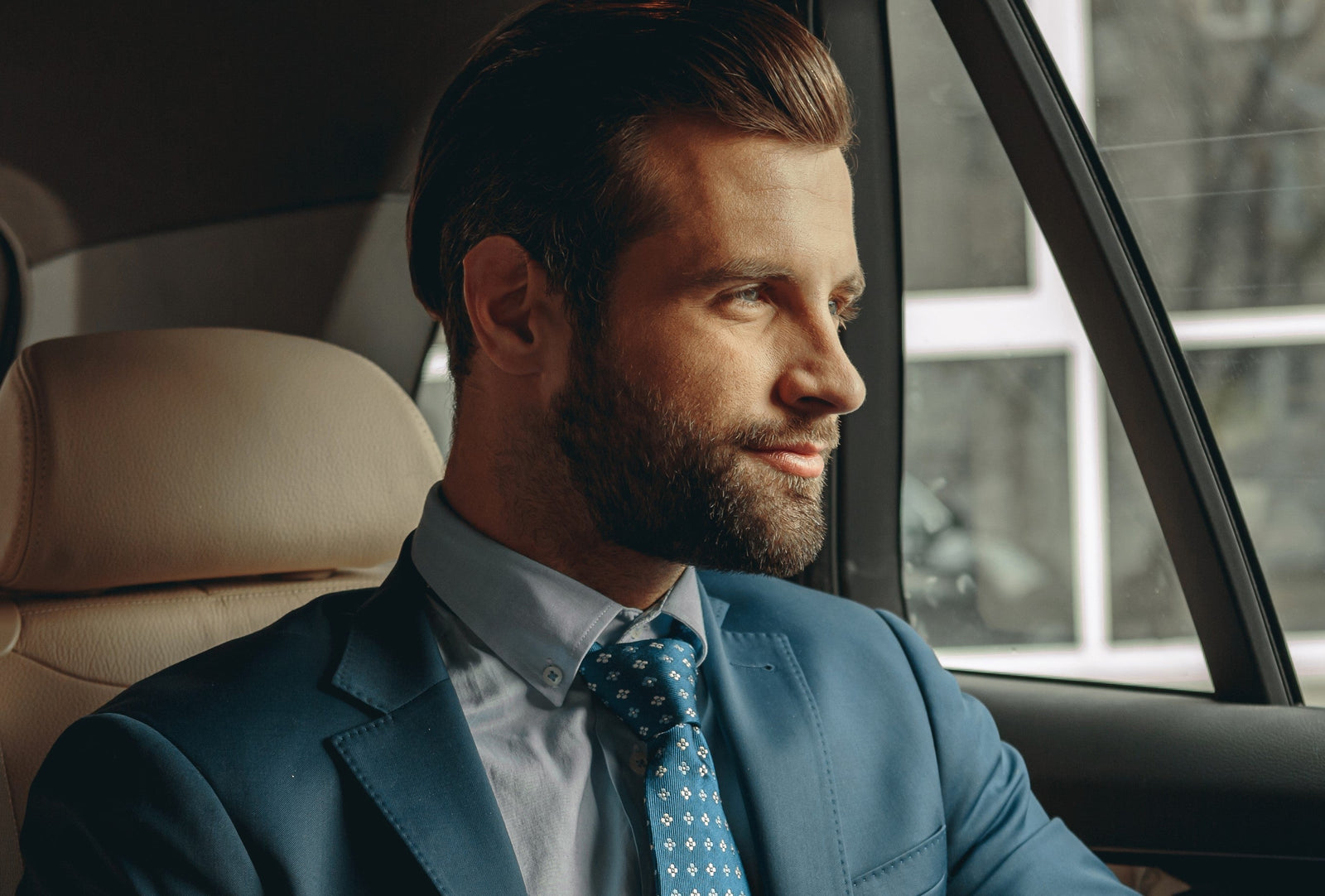 Well-groomed successful man with a clean beard and confident professional appearance