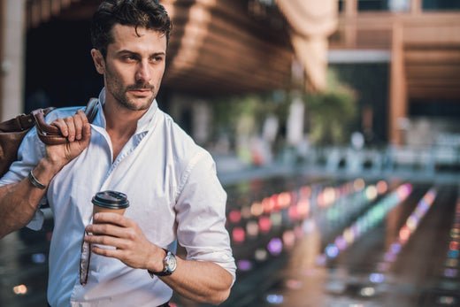 Illustration of a man in front of a mirror adjusting his hair and beard with a calendar showing January.
