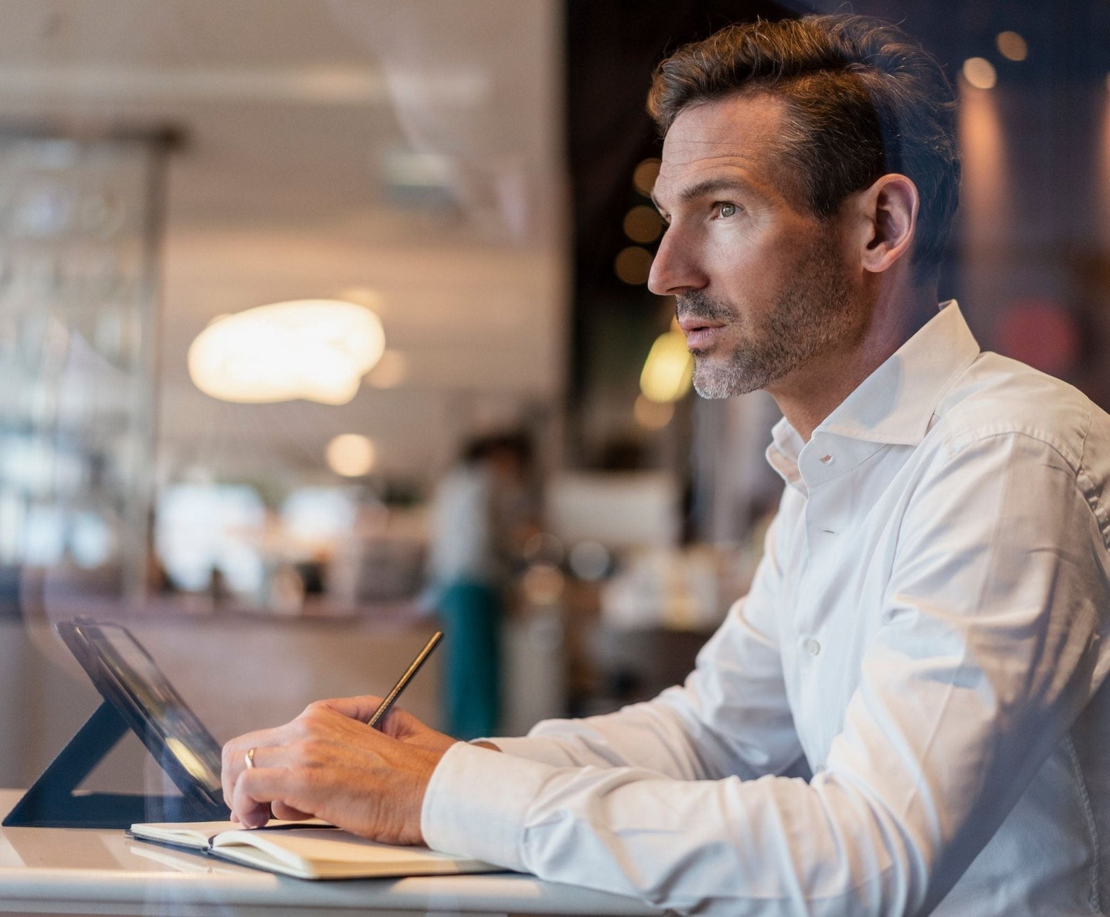 Disciplined man planning high-class goals for personal growth and success