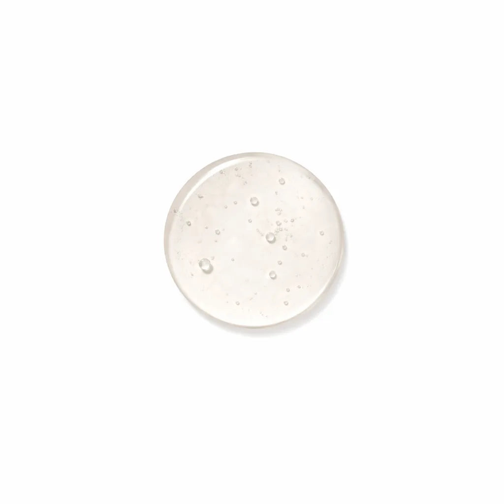 Knightsmen organic body wash gel being poured showing rich natural coconut-based lather and creamy consistency