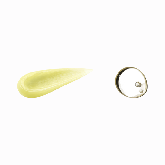 Close-up texture of hair balm and hair oil showing natural formula
