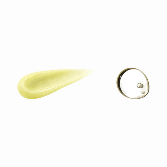 Close-up texture of hair balm and hair oil showing natural formula
