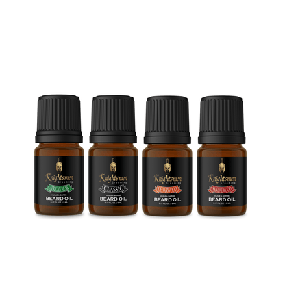Knightsmen beard oil bundle—African Musk, Classic, Cedarwood, Sandalwood 5 ml bottles with caps on white.