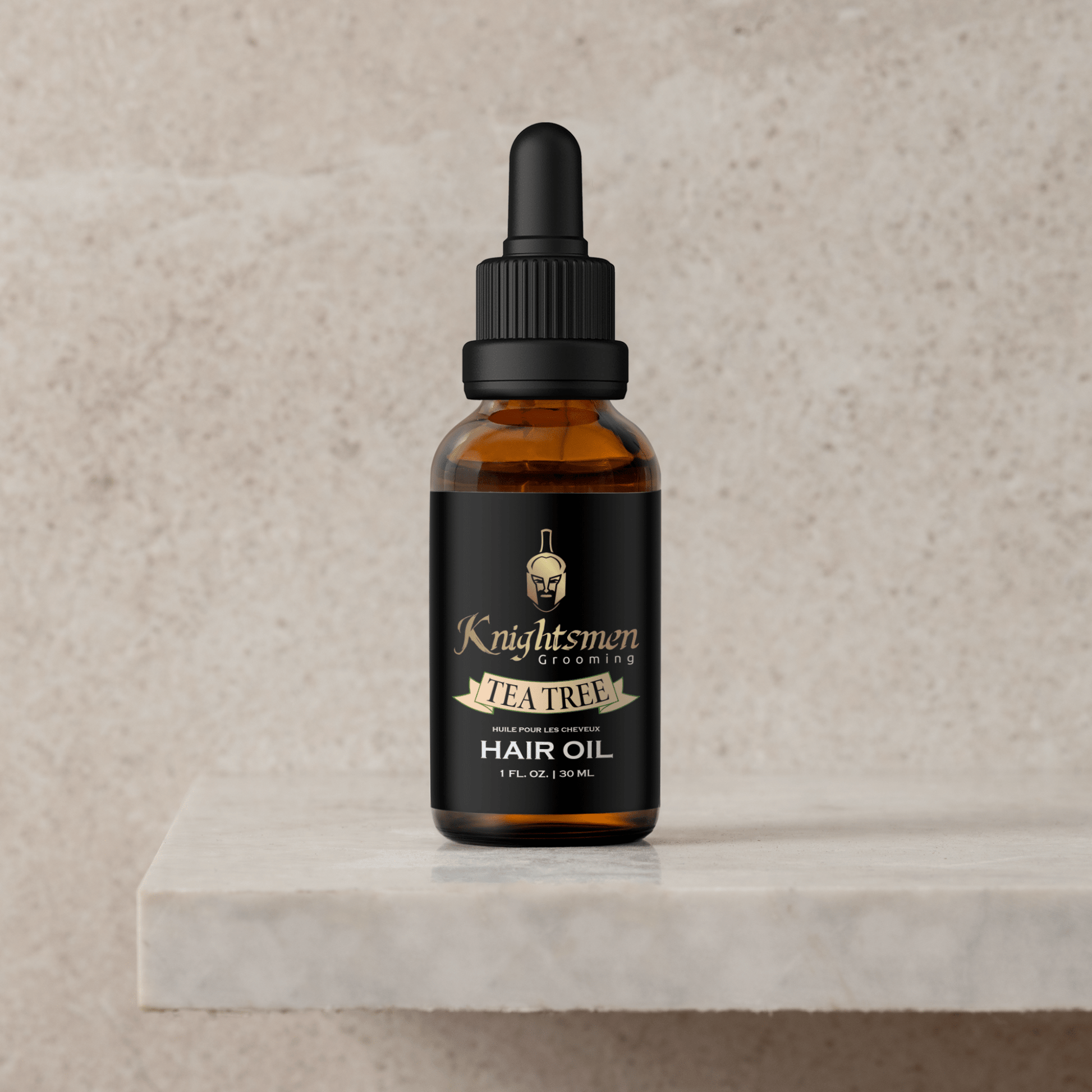 Tea Tree hair oil on stone pedestal—organic hair oil, organic hair growth oil, Hair oil for growth, best hair oil for hair growth, made in Canada.
