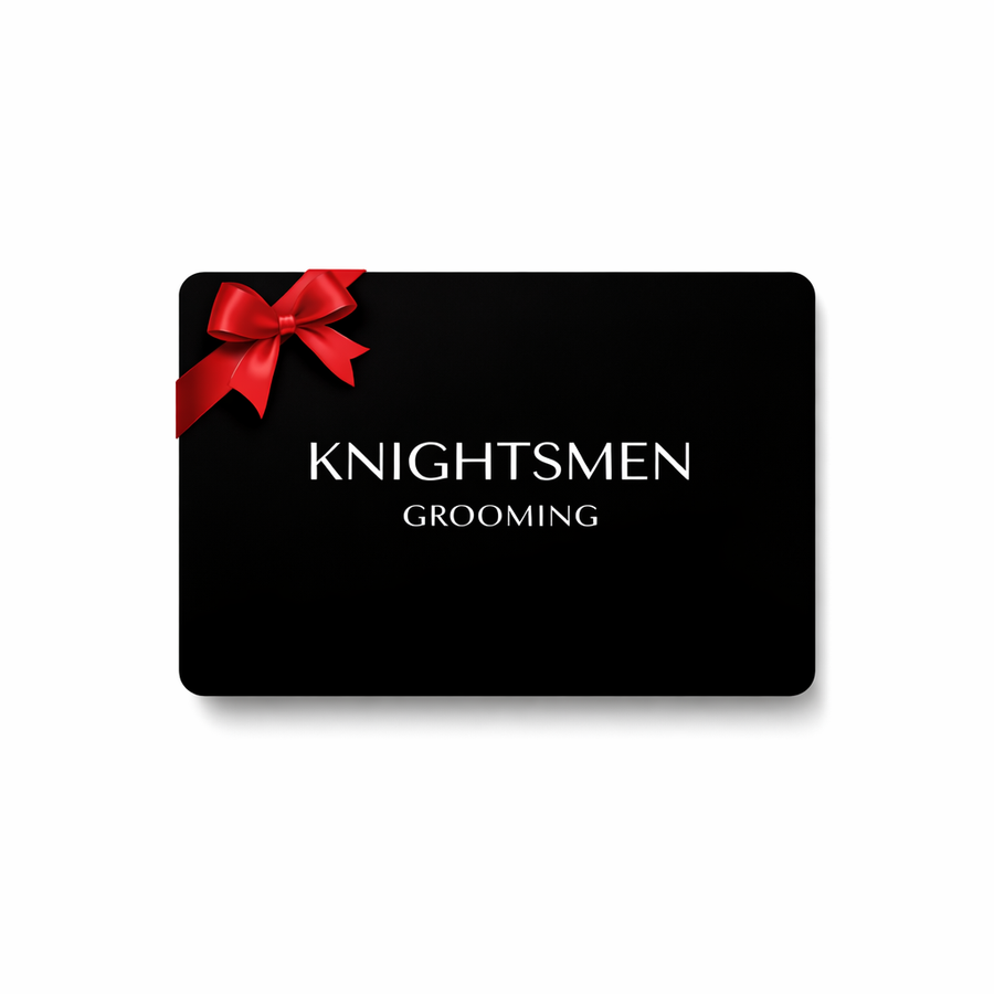 Black gift card with a red bow labeled 'Knightsmen Grooming' on a white background