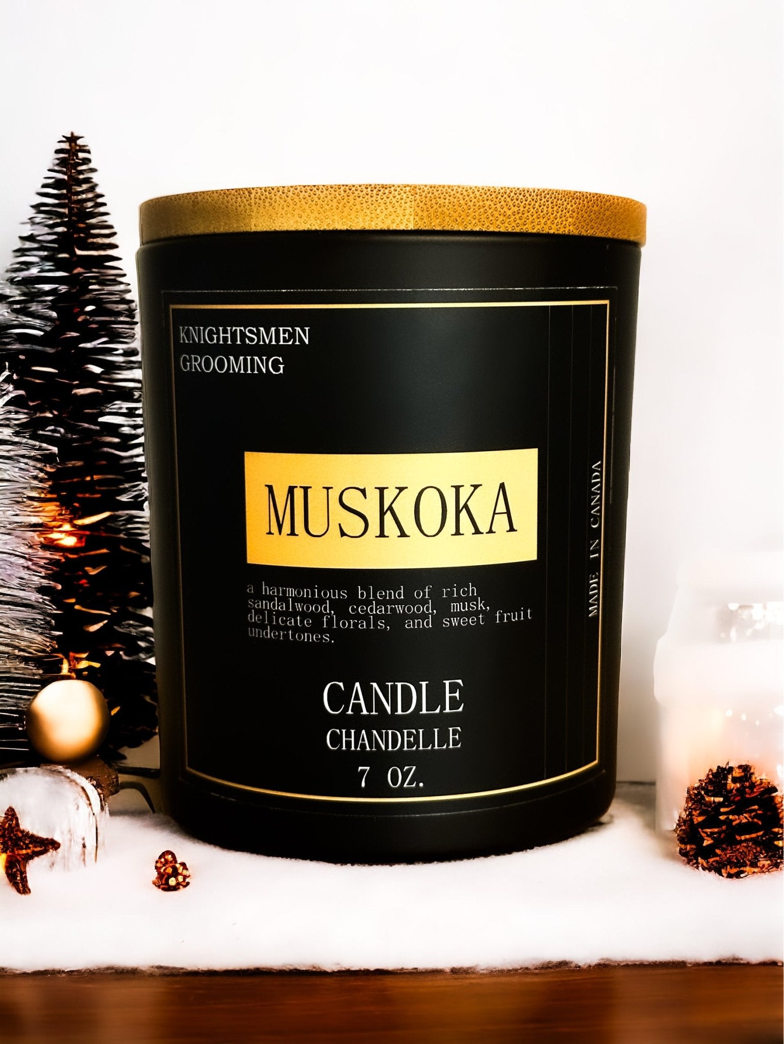 Muskoka candle in a decorative setting with Christmas decorations